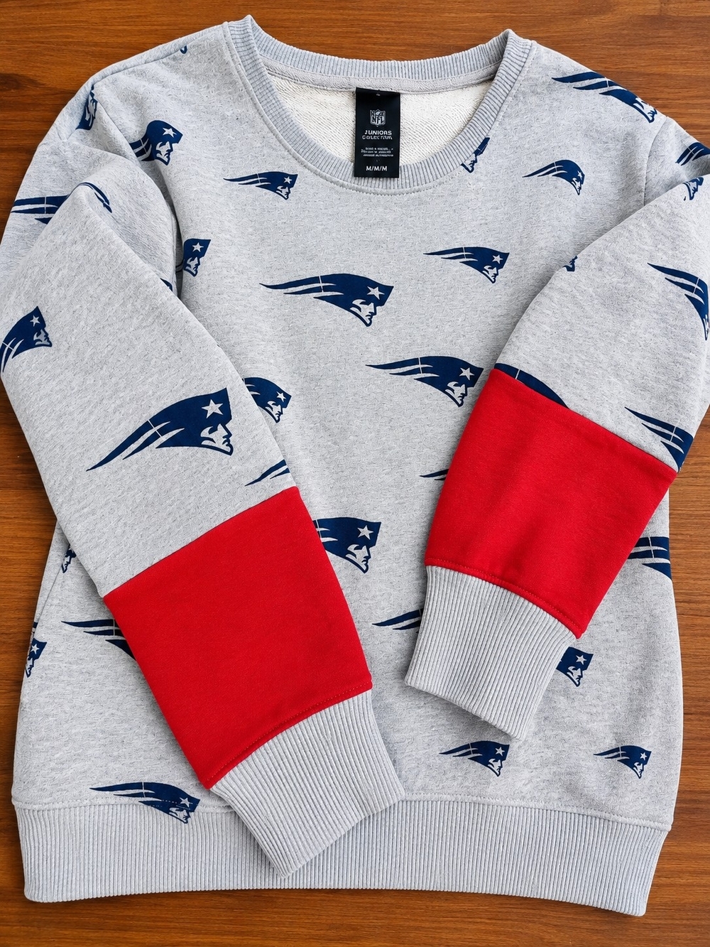 NFL Women's Gray Sweatshirt with Navy Logo Pattern and Red Sleeve Panels